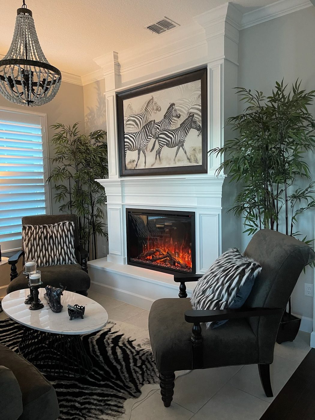 Fireplace framed by a white trim accent wall