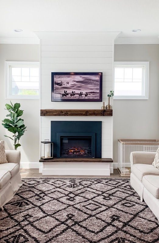 TV mounted over a fireplace bump wall