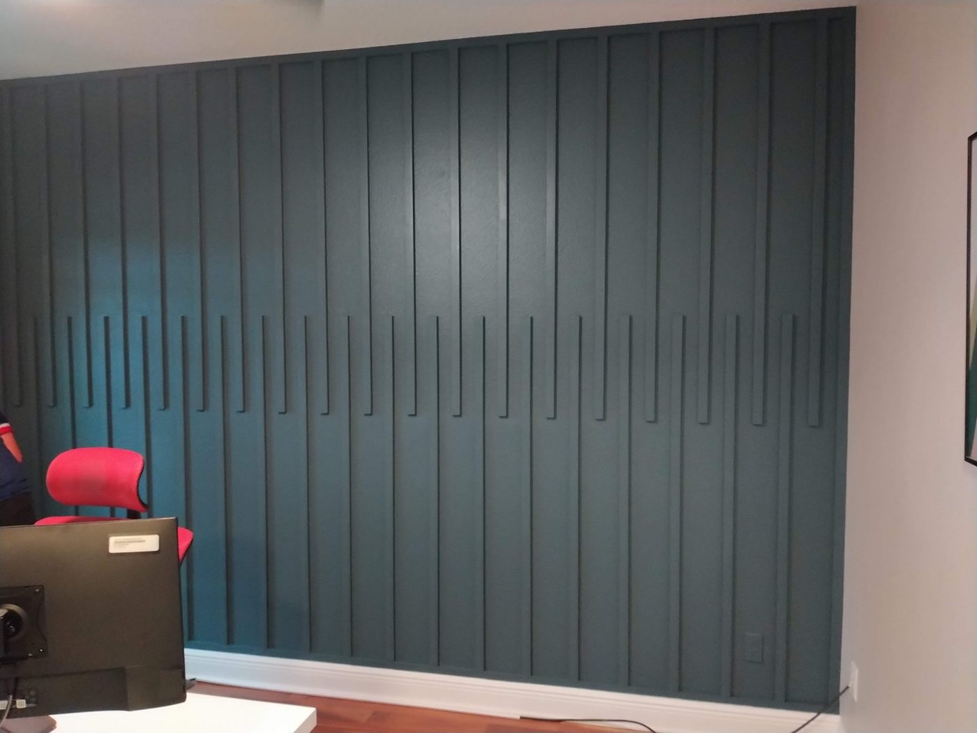 Dark vertical slat accent wall